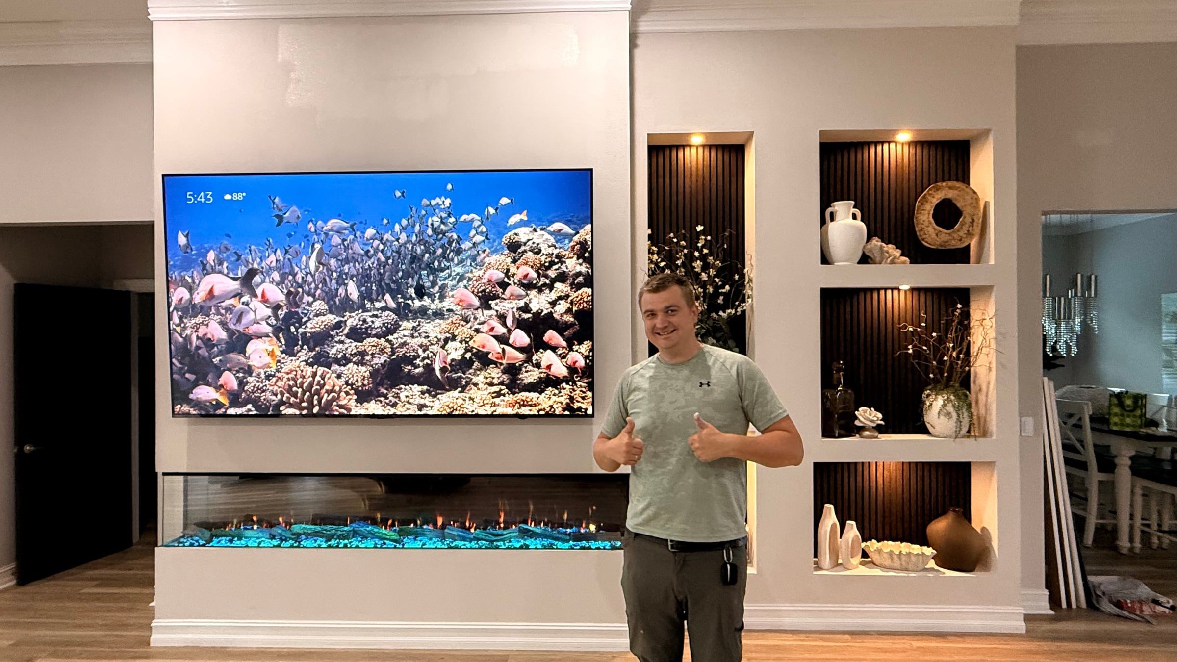 Media Wall with Lit Display Niches and Linear Fireplace in Melbourne, FL